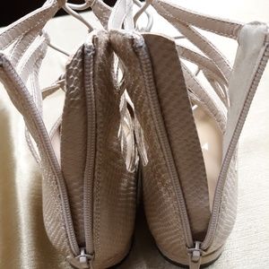 Women's flat, zipper back shoe.